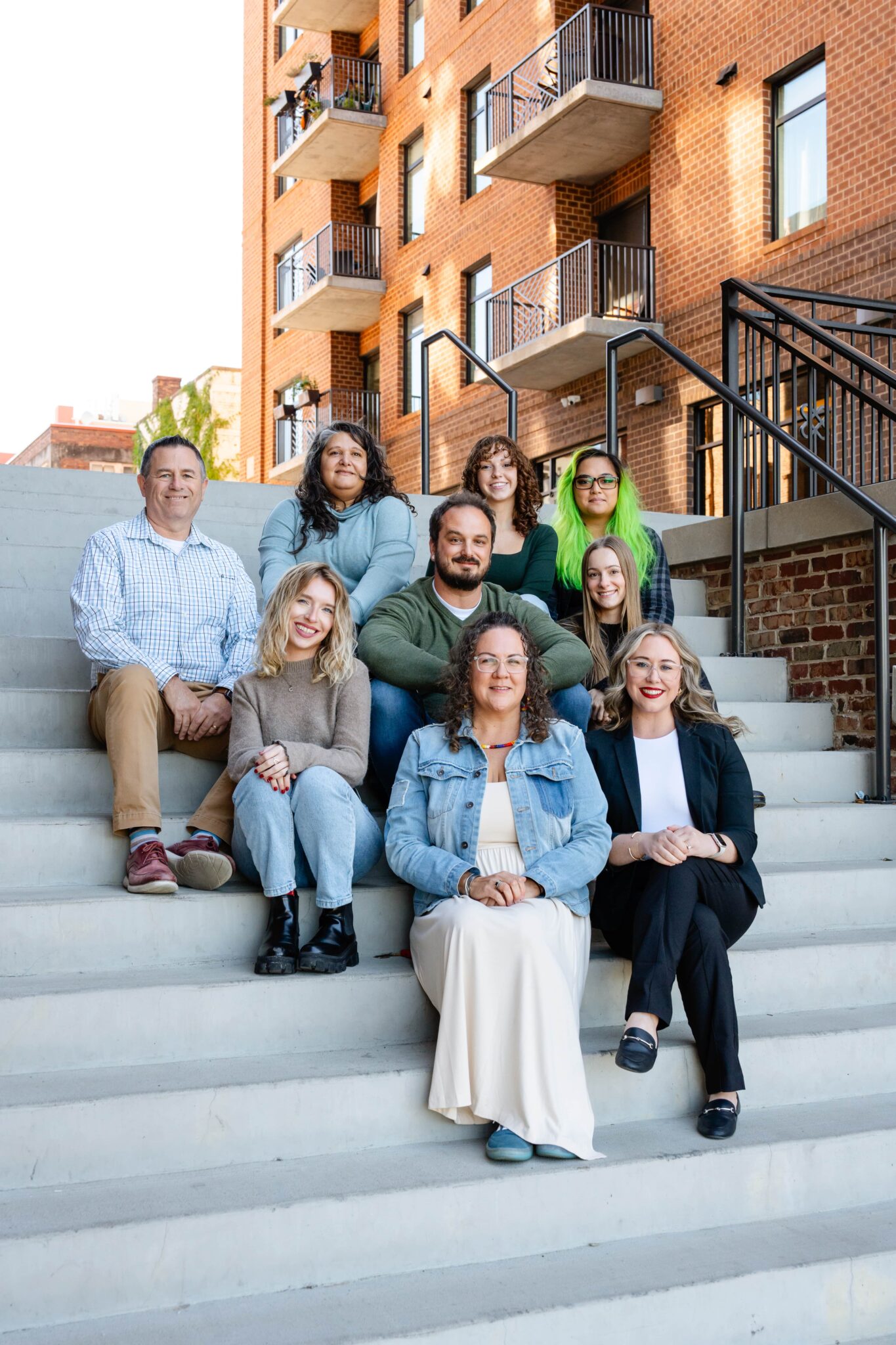 The DesignLoud team on the steps in downtown Wilmington